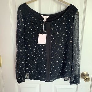Black long sleeve blouse with white hearts
